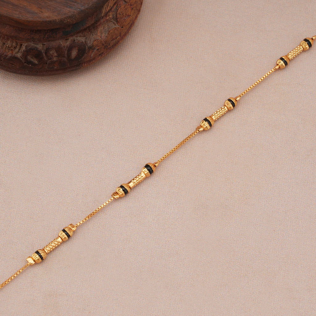 Sleek antique gold mangalsutra bracelet