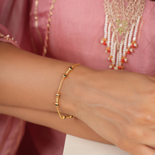 Sleek antique gold mangalsutra bracelet