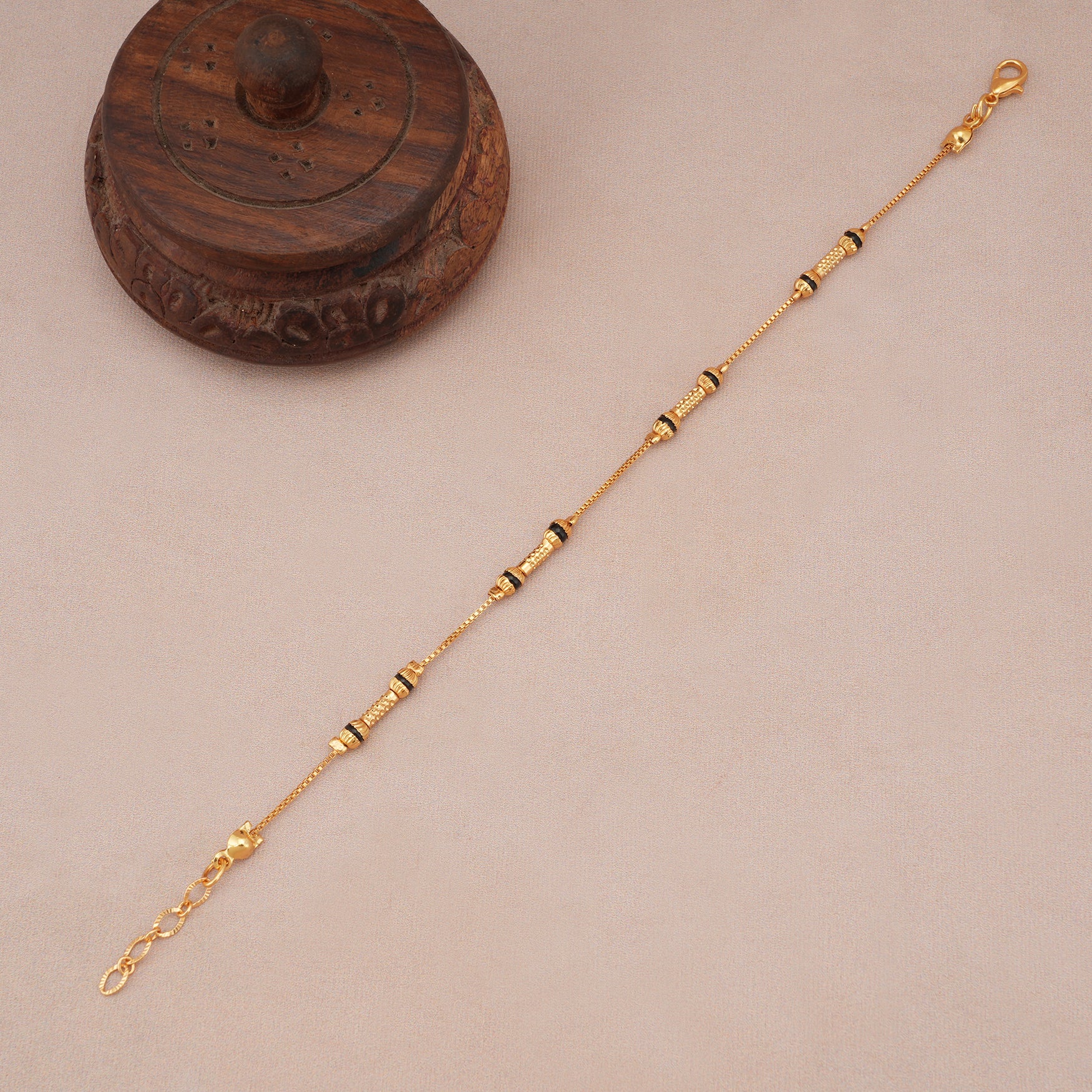 Sleek antique gold mangalsutra bracelet