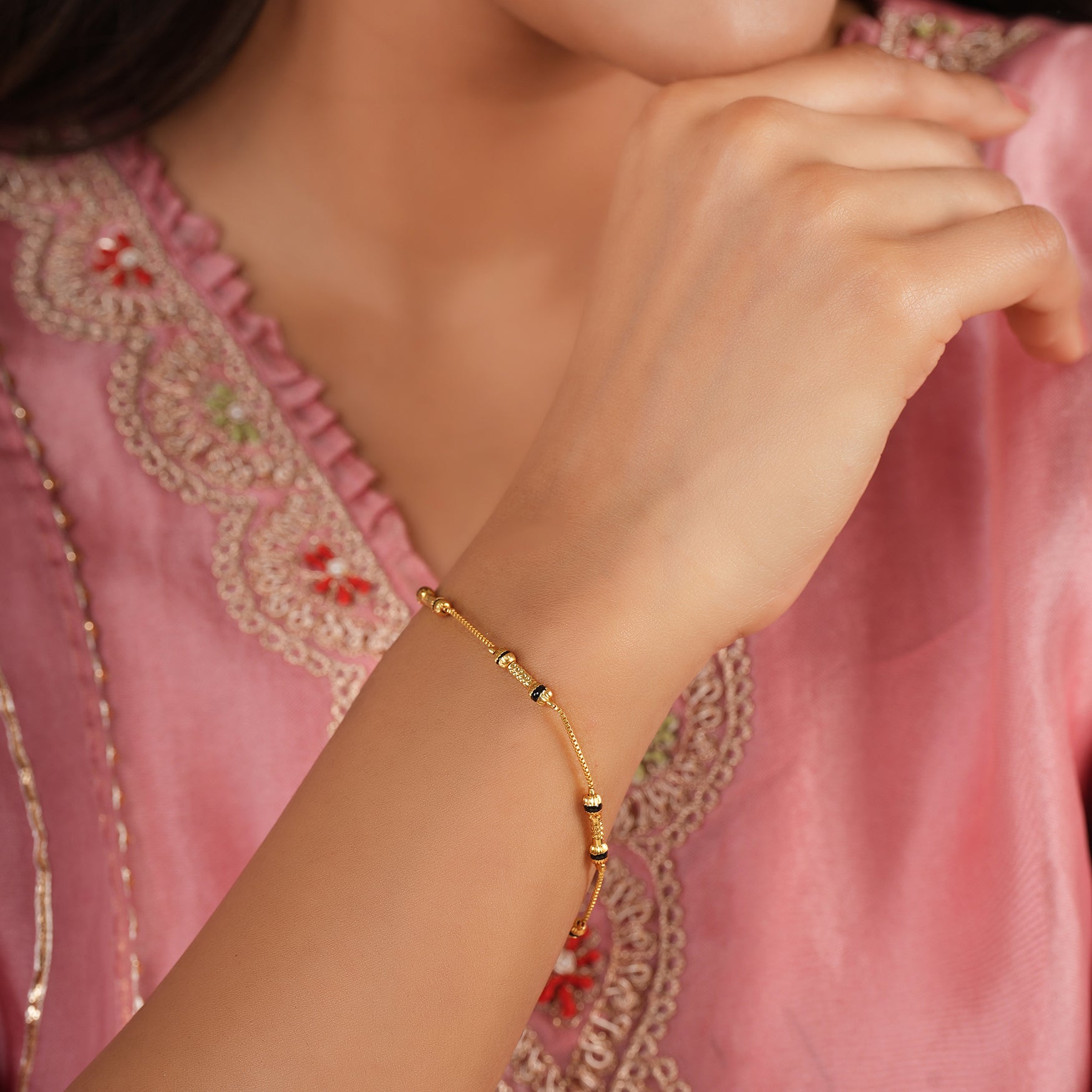 Sleek antique gold mangalsutra bracelet