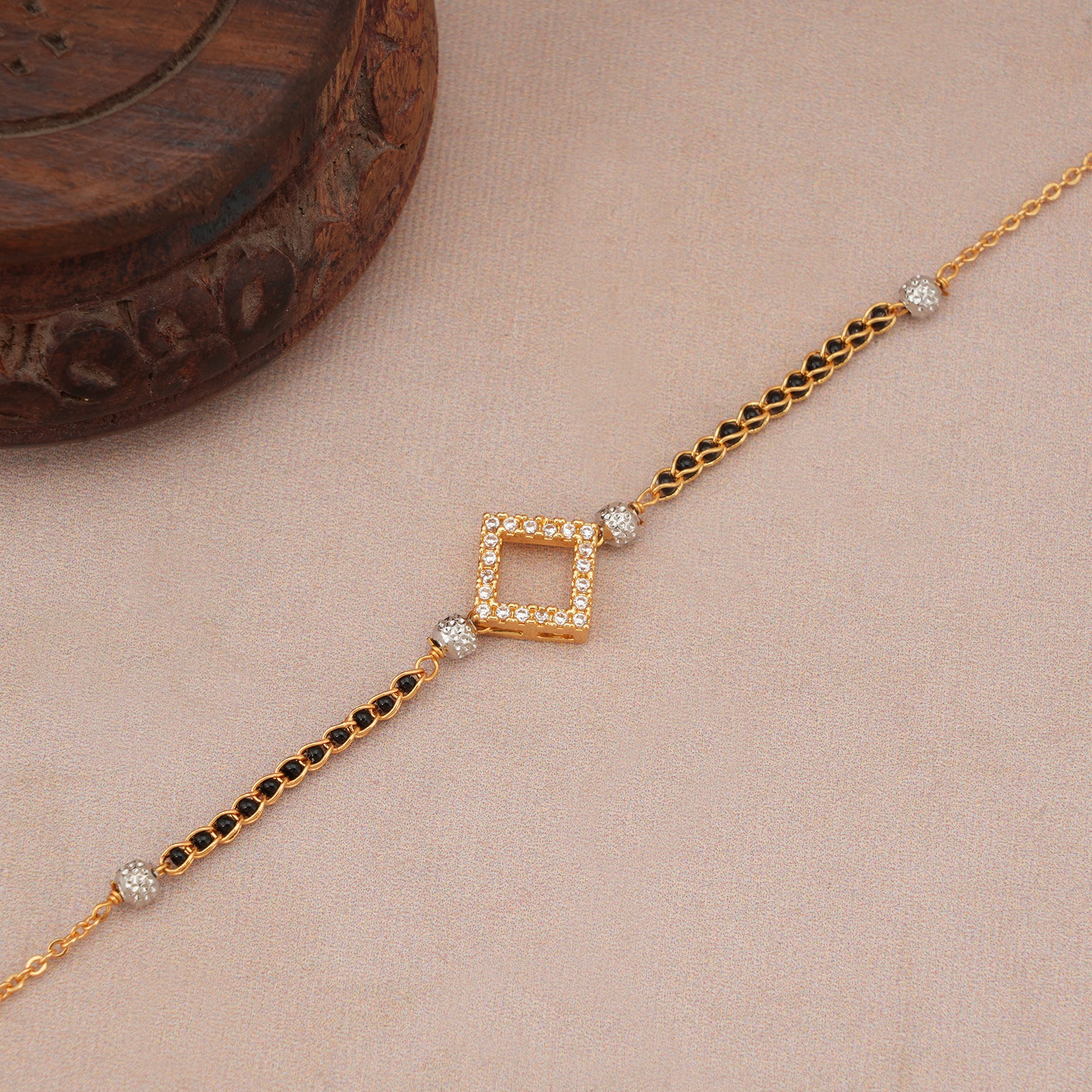Cute sleek diamond antique gold mangalsutra bracelet