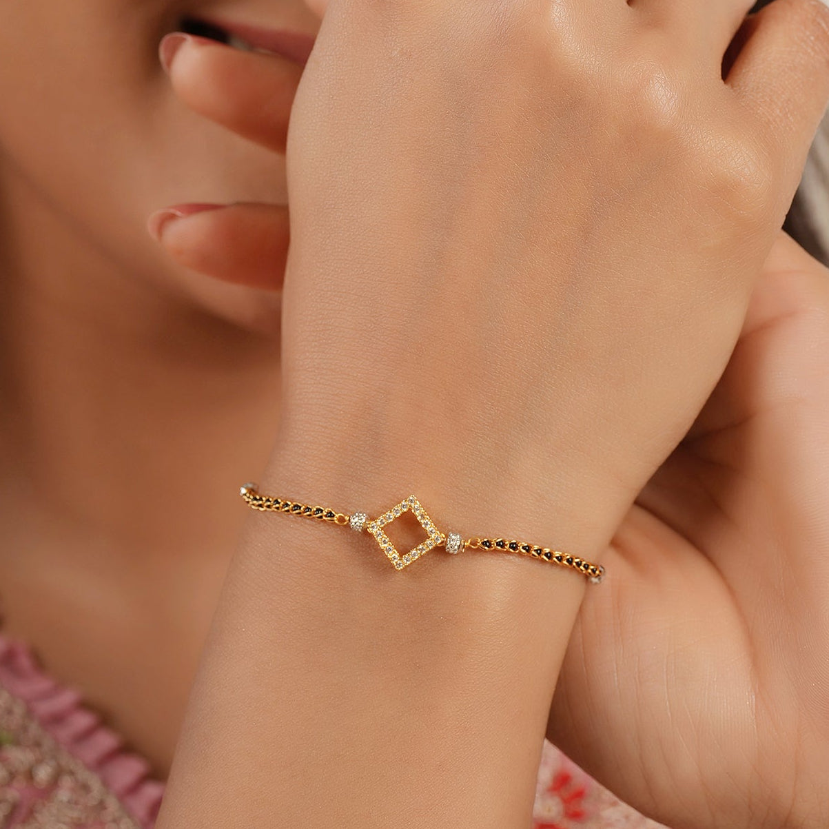 Cute sleek diamond antique gold mangalsutra bracelet