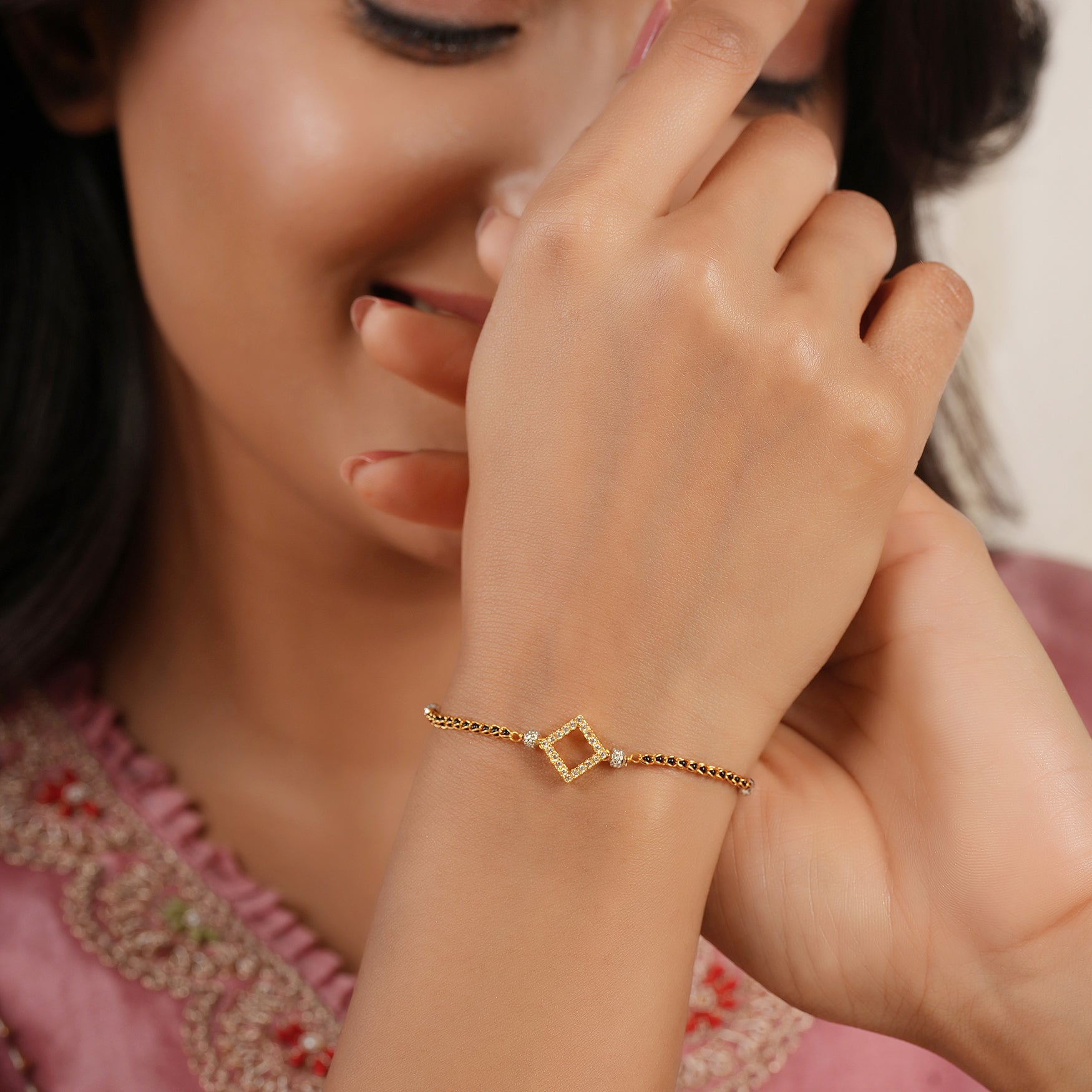 Cute sleek diamond antique gold mangalsutra bracelet