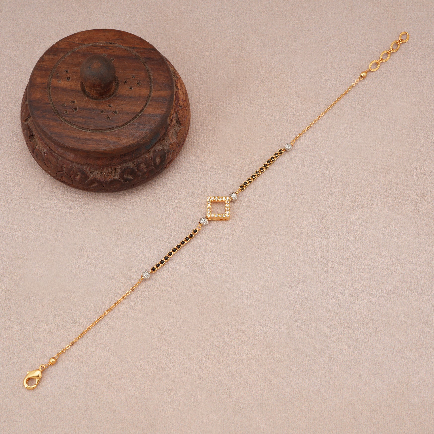 Cute sleek diamond antique gold mangalsutra bracelet
