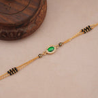 Cute sleek emerald stone mangalsutra bracelet