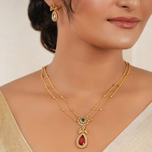 Beautiful long gold plated stone pendant set