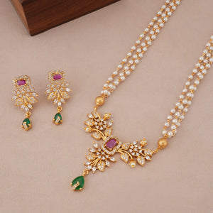 Stunning long pearl dimaond pendant set