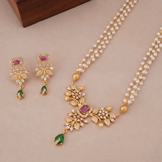 Stunning long pearl dimaond pendant set