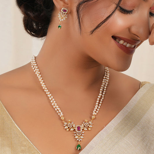 Stunning long pearl diamond pendant set
