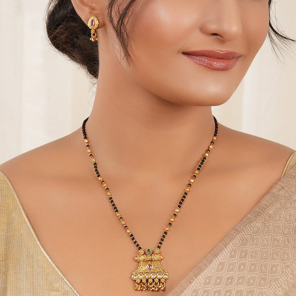 Stunning kundan antique gold mangalstura set