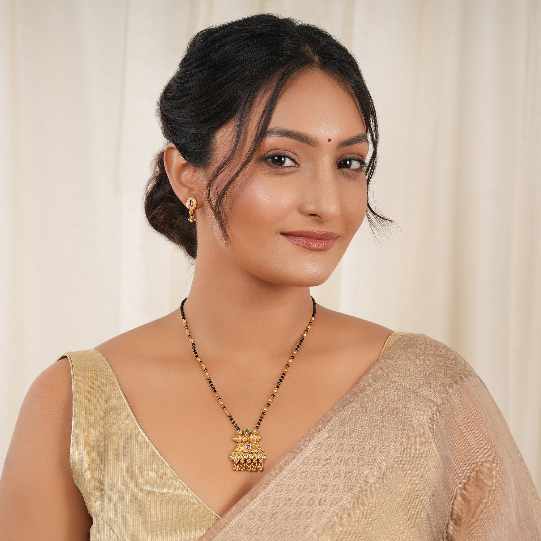 Stunning kundan antique gold mangalstura set