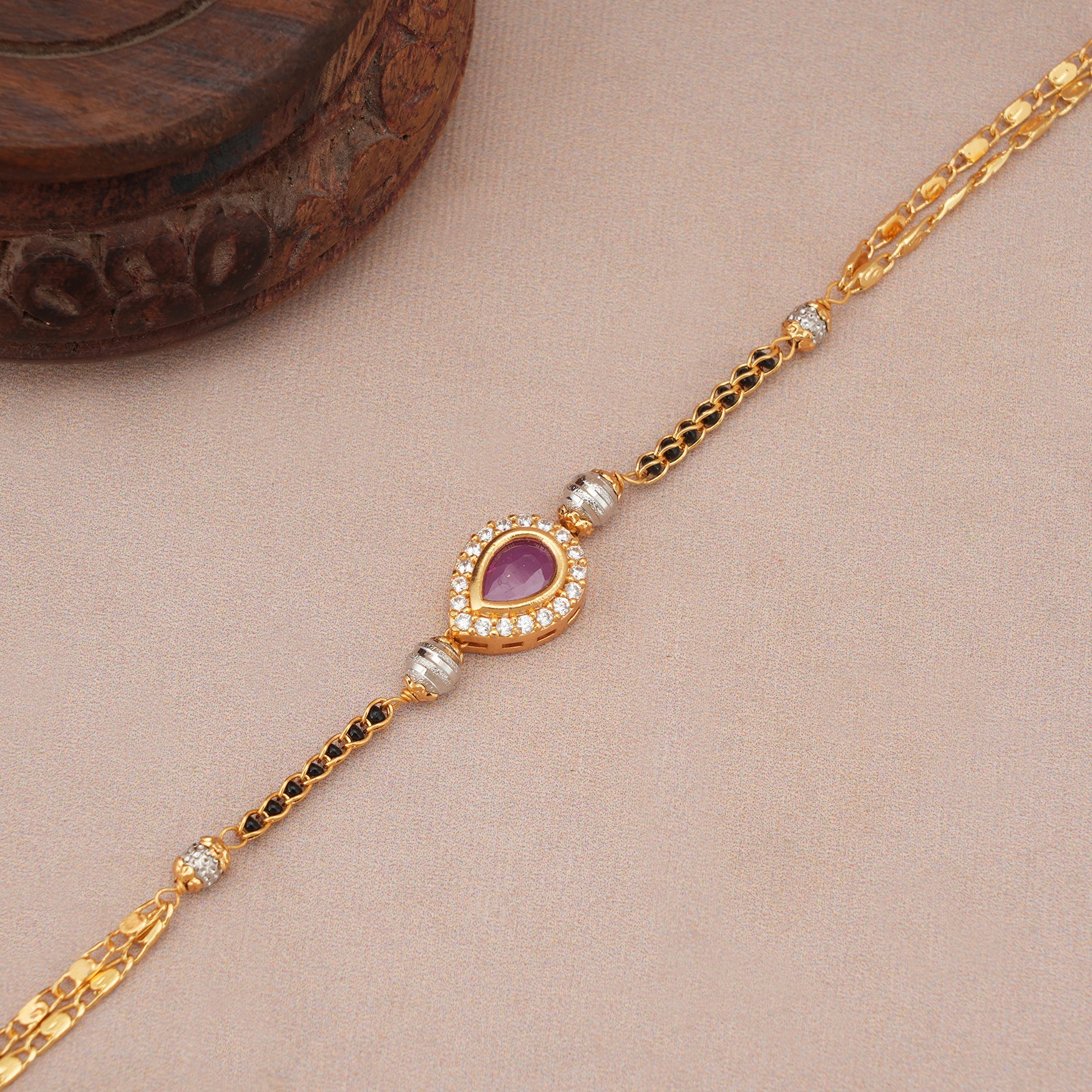 Cute elegant ruby gold mangalsutra bracelet