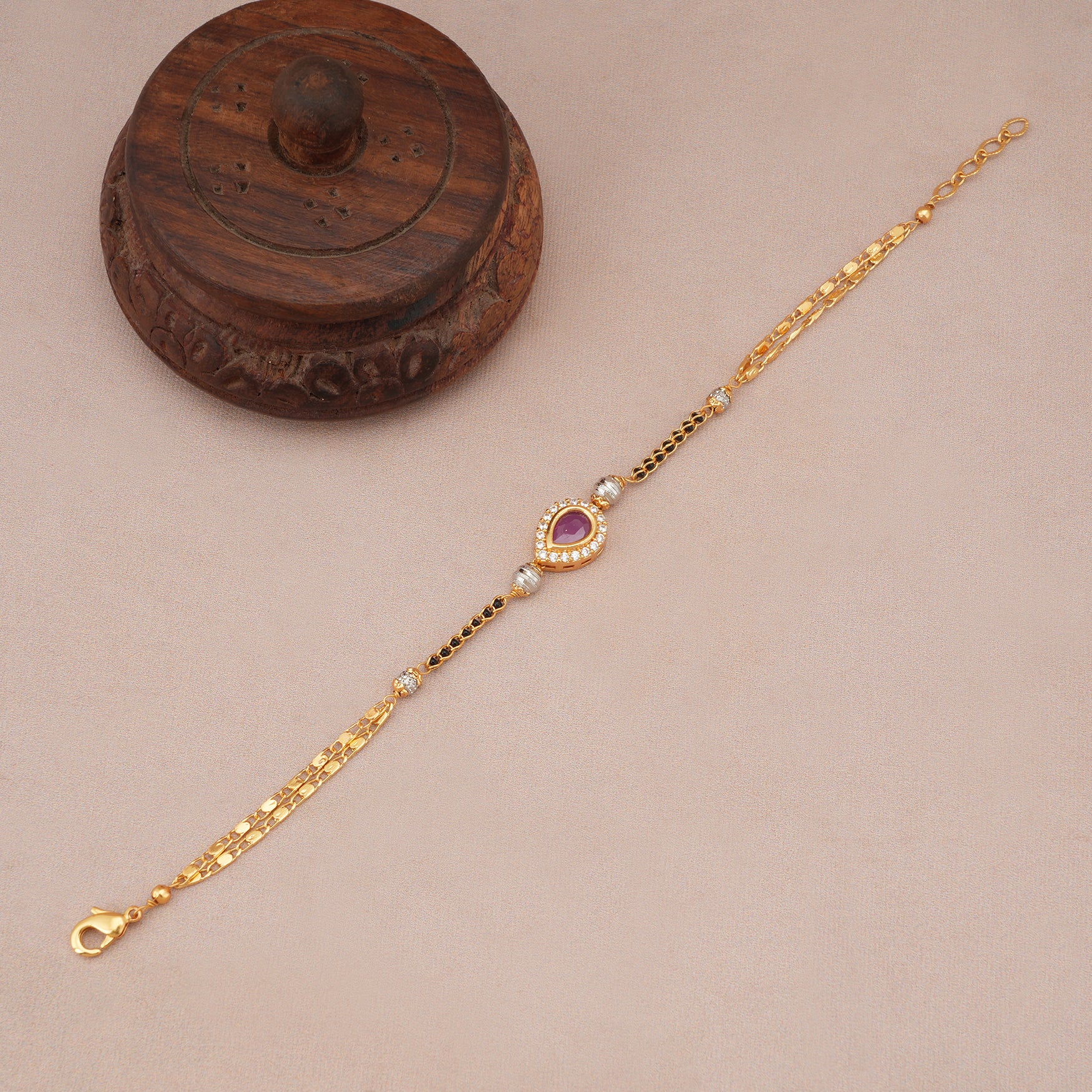 Cute elegant ruby gold mangalsutra bracelet