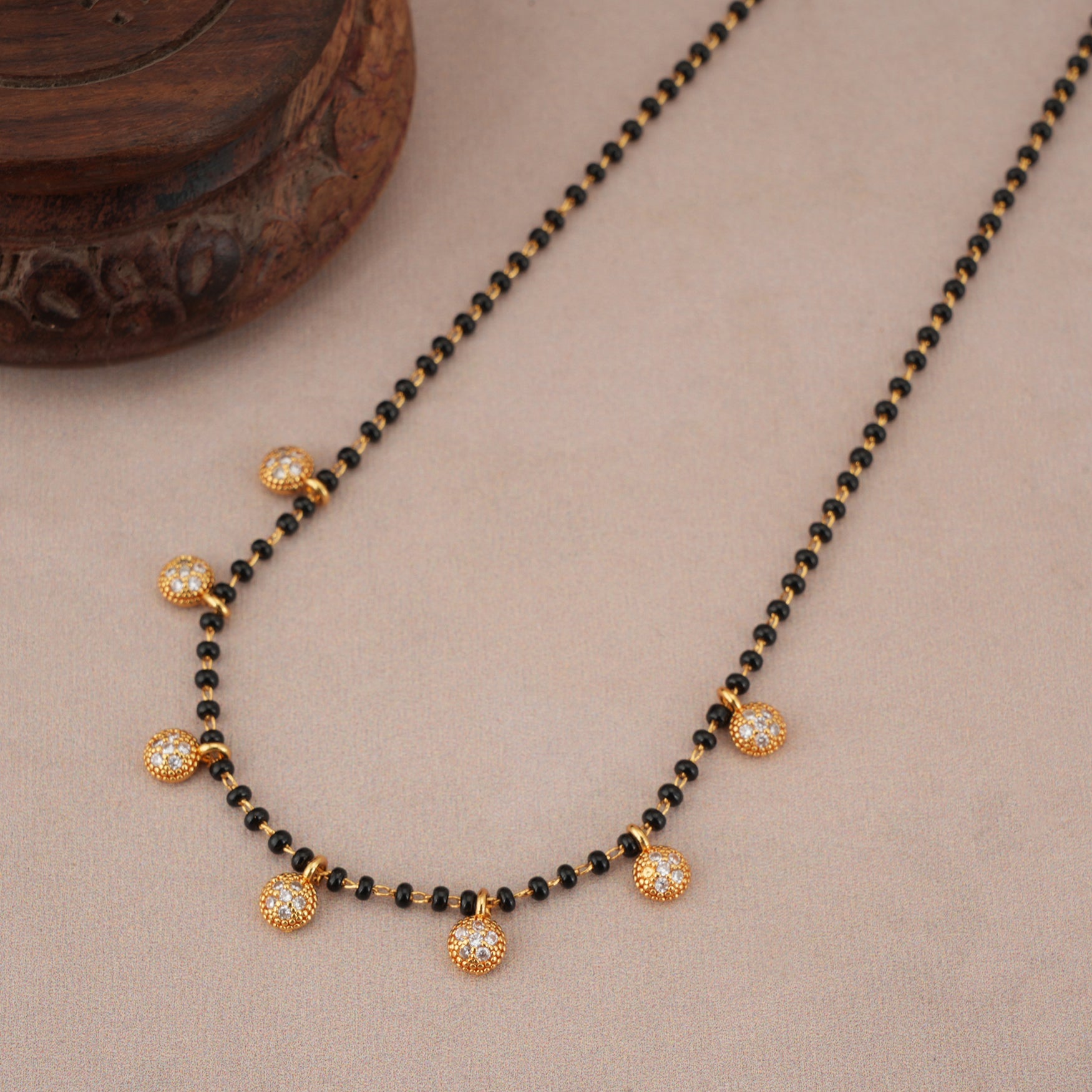 Elegant diamond ball gold plated mangalstura