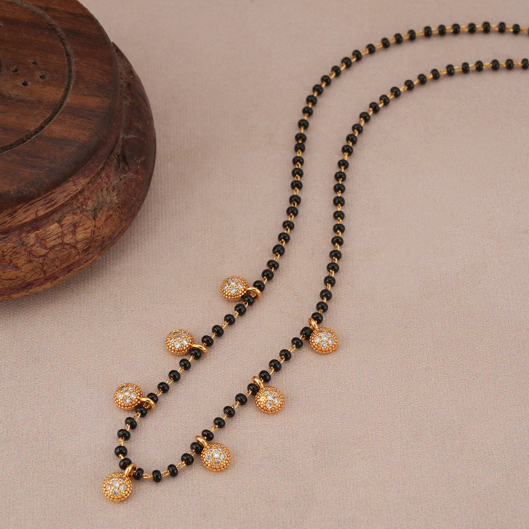 Elegant diamond ball gold plated mangalstura