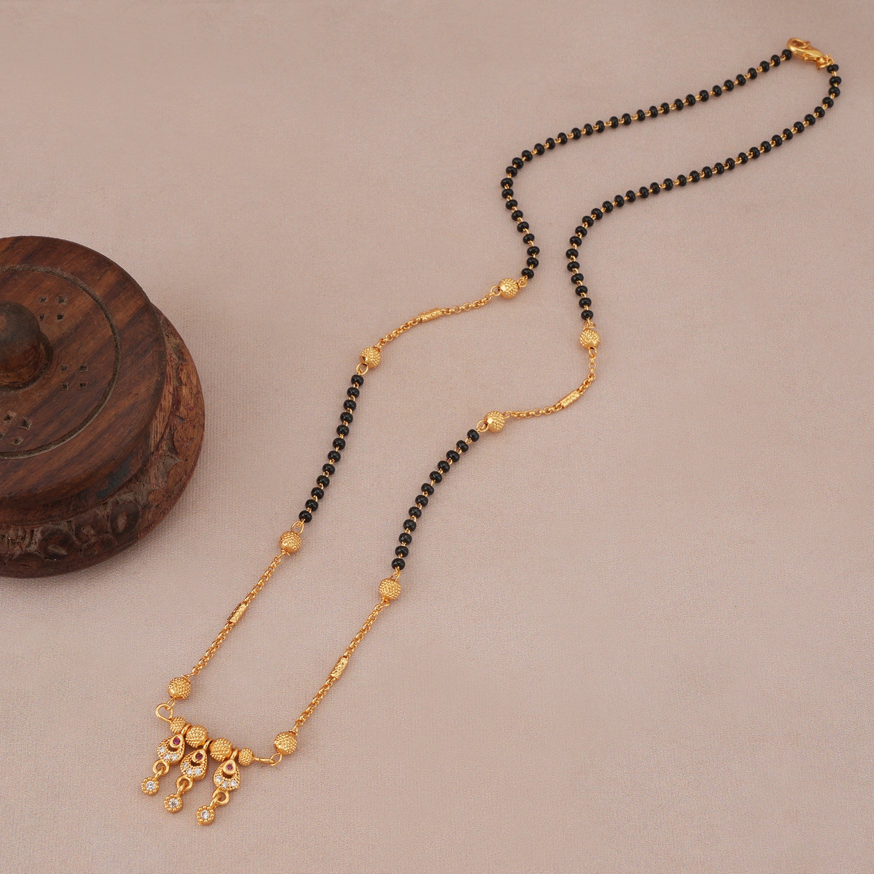 Sleek gold ball plated diamond mangalsutra