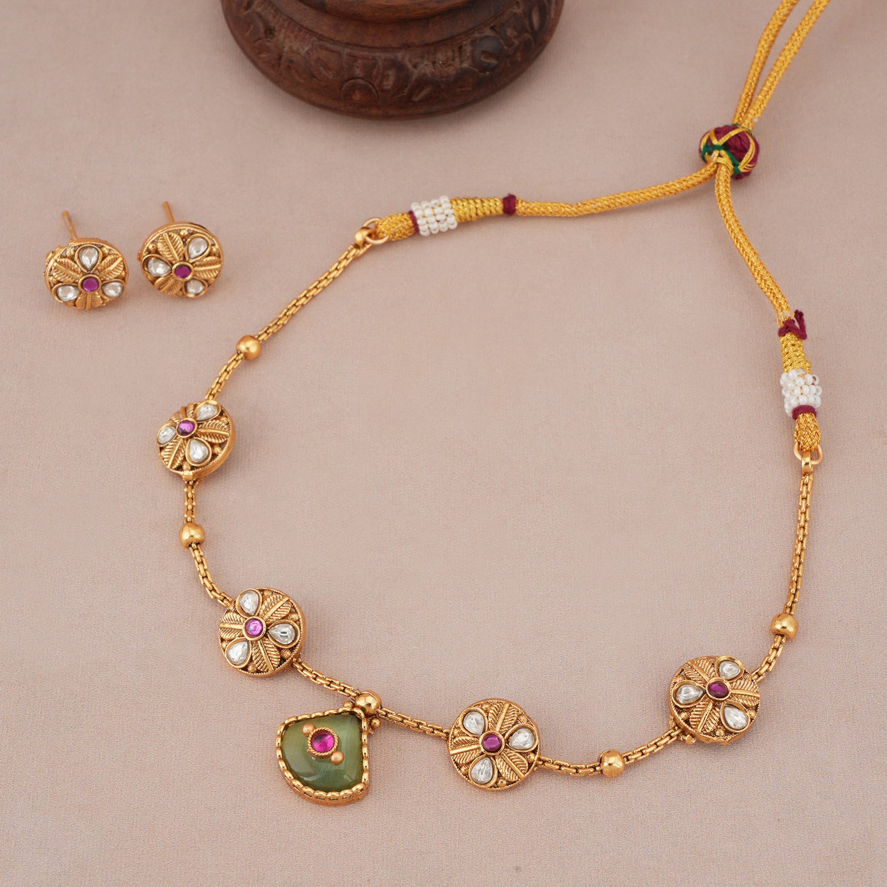 Beautiful gold emerald vada necklace set