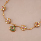 Beautiful gold emerald vada necklace set