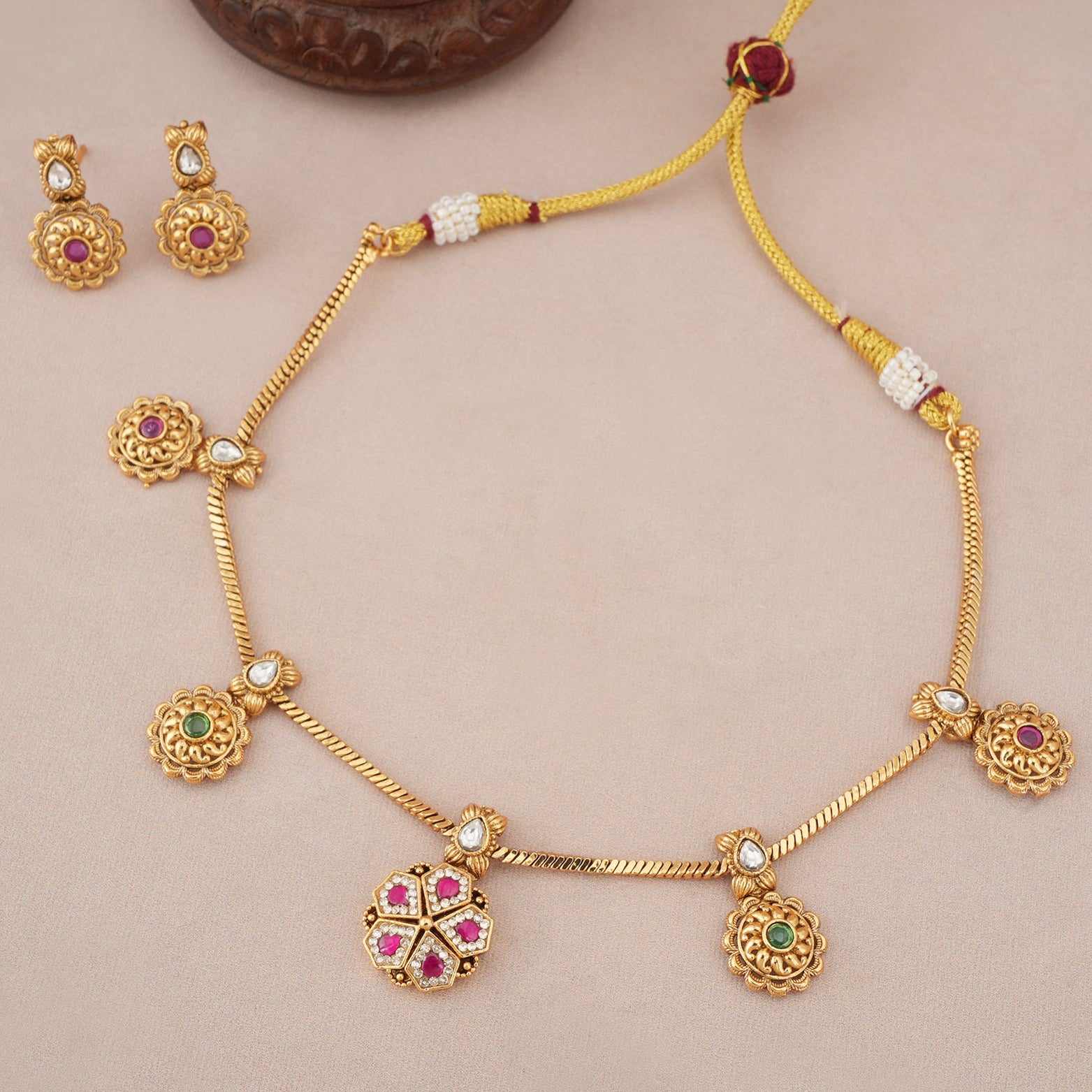 Beautiful antique gold gulika bloom necklace set