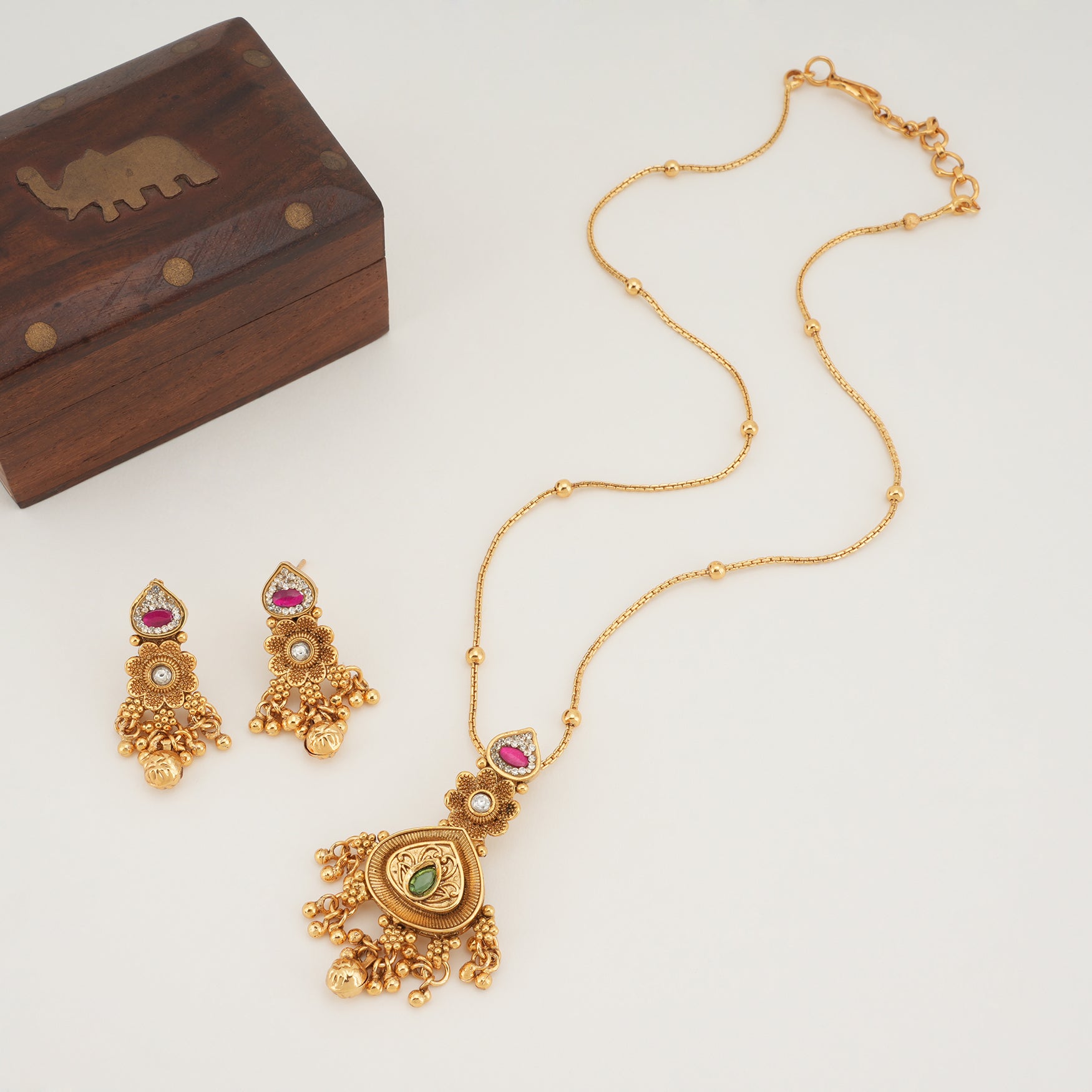 Beautiful stone gold plated pendant set with earring
