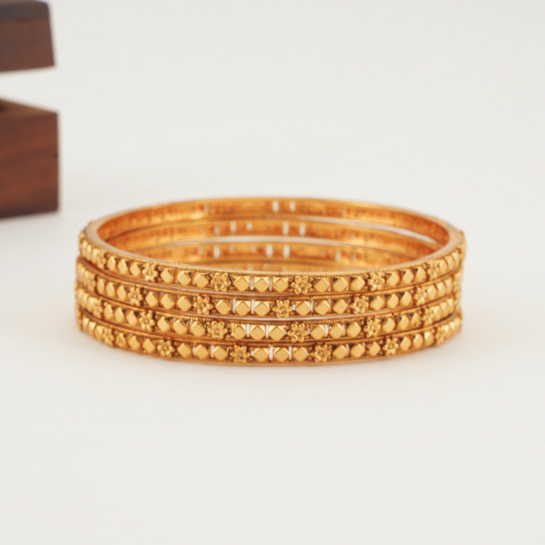 Plain sleek gold bangle set (set of 4)