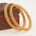 Plain floral gold bangle set