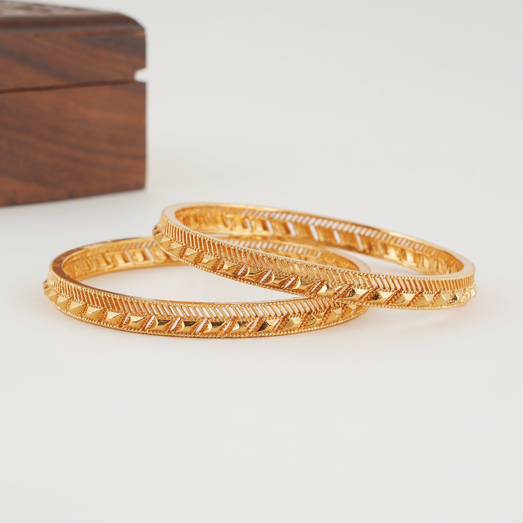 Sleek plain gold bangle set