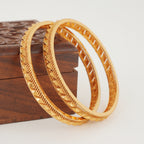 Sleek plain gold bangle set
