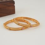 Beautiful stone gold bangle set
