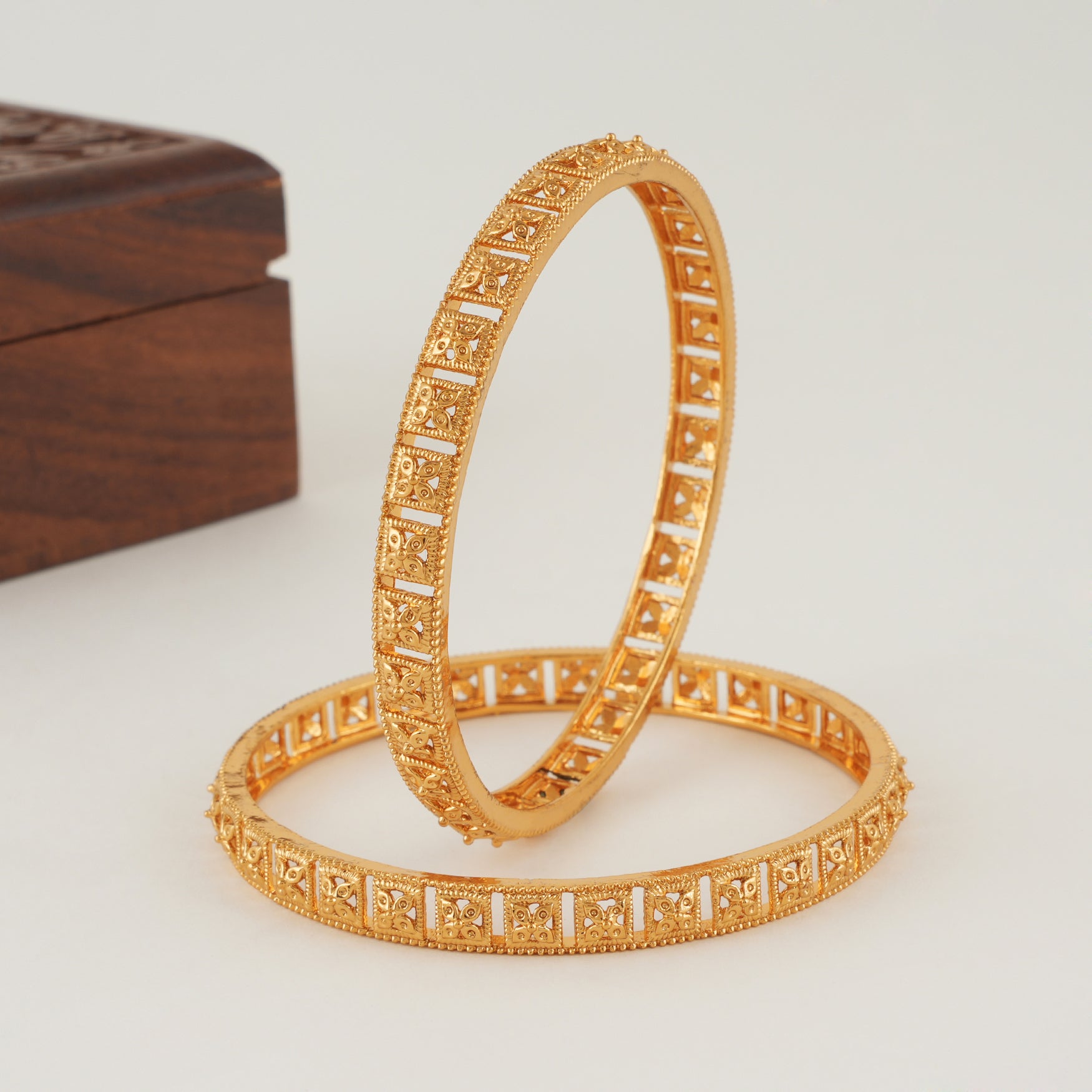 Beautiful plain floral gold bangle set