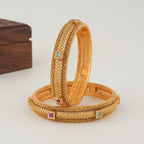 Beautiful intricate plain gold bangle set