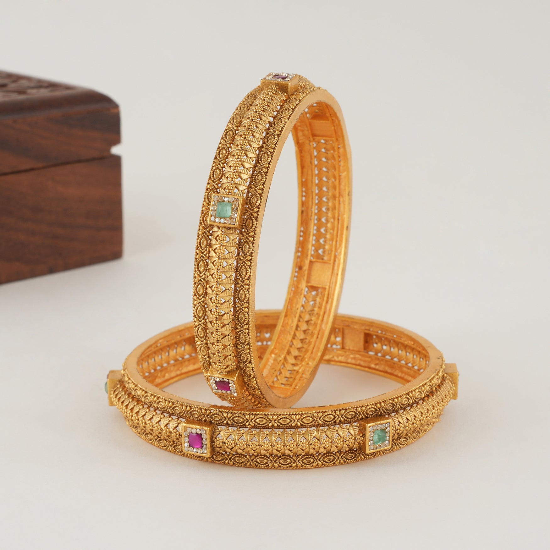 Beautiful intricate plain gold bangle set