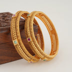 Beautiful intricate plain gold bangle set