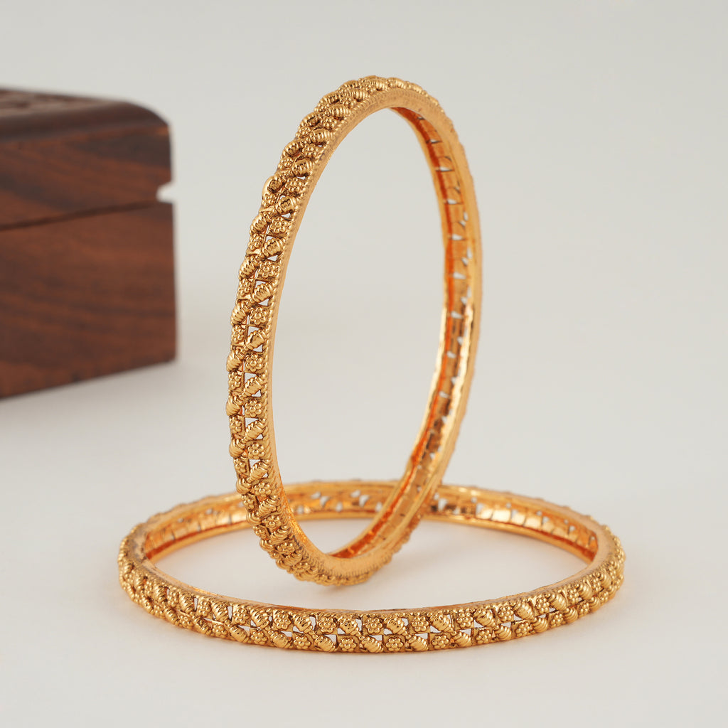 Sleek leaf plain gold bangle set