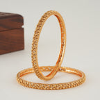 Sleek leaf plain gold bangle set
