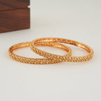 Sleek leaf plain gold bangle set