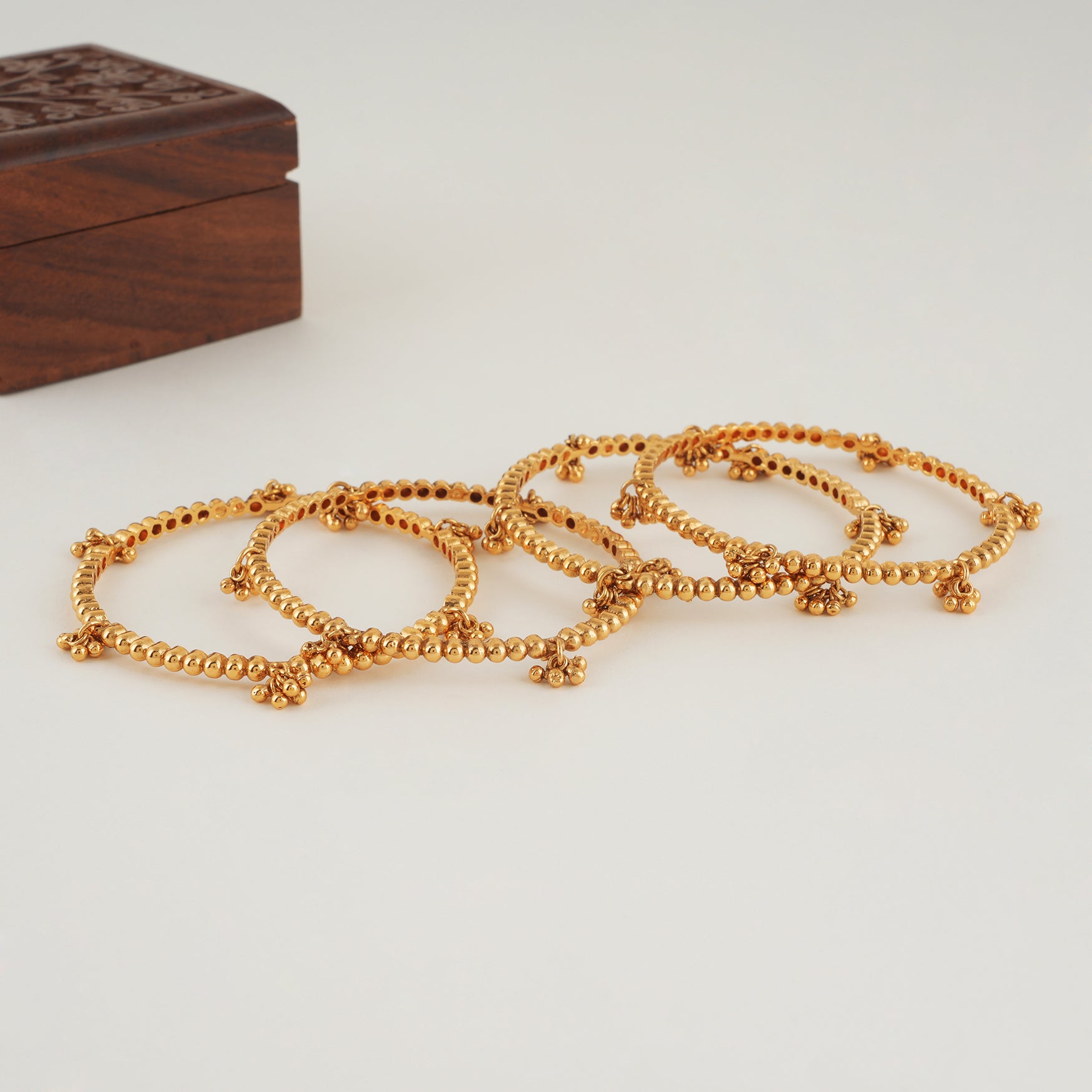 Plain gold kashmiri bangle set (set of 4)