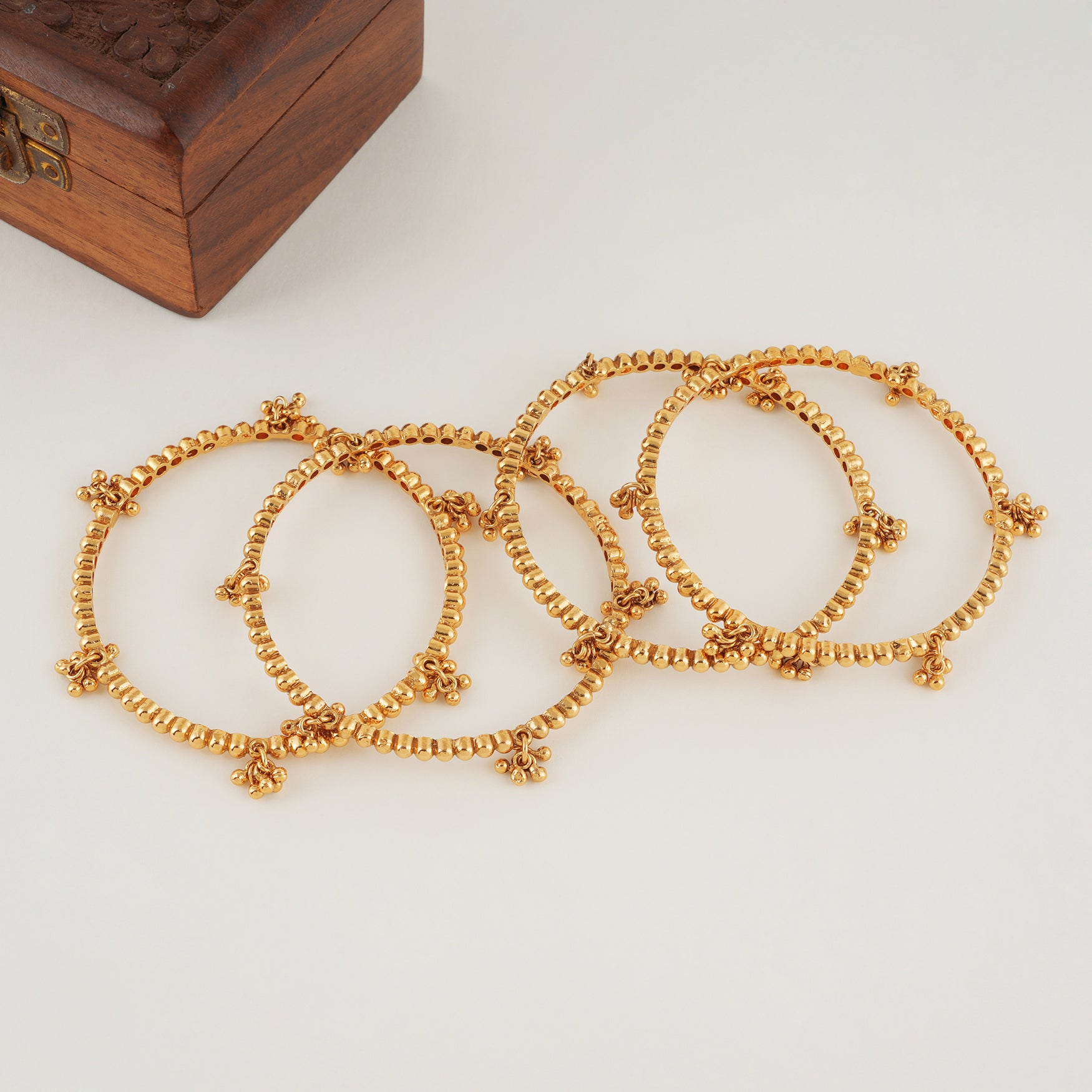 Plain gold kashmiri bangle set (set of 4)