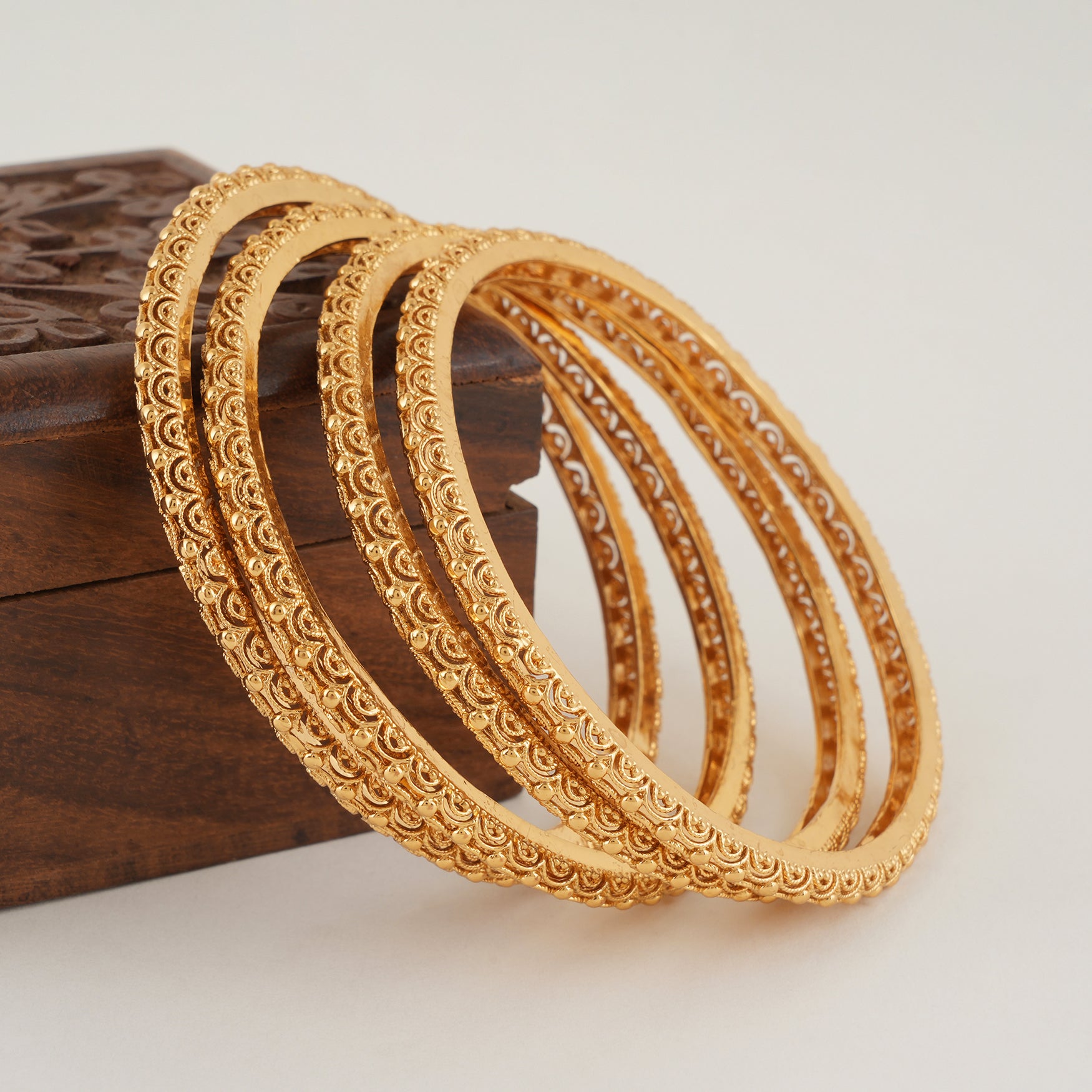 Stunning plain gold bangle set