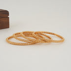 Stunning plain gold bangle set