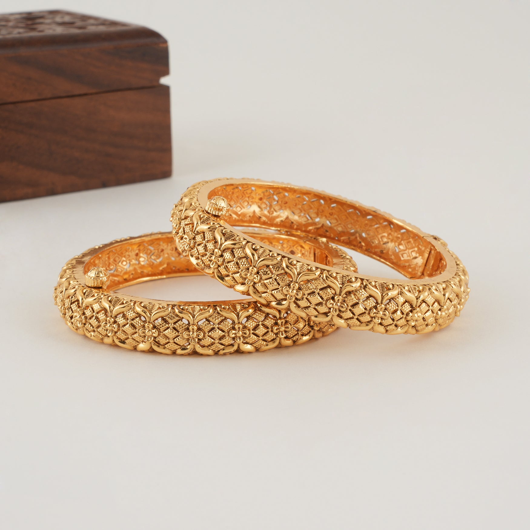 Stunning plain broad gold bangle set
