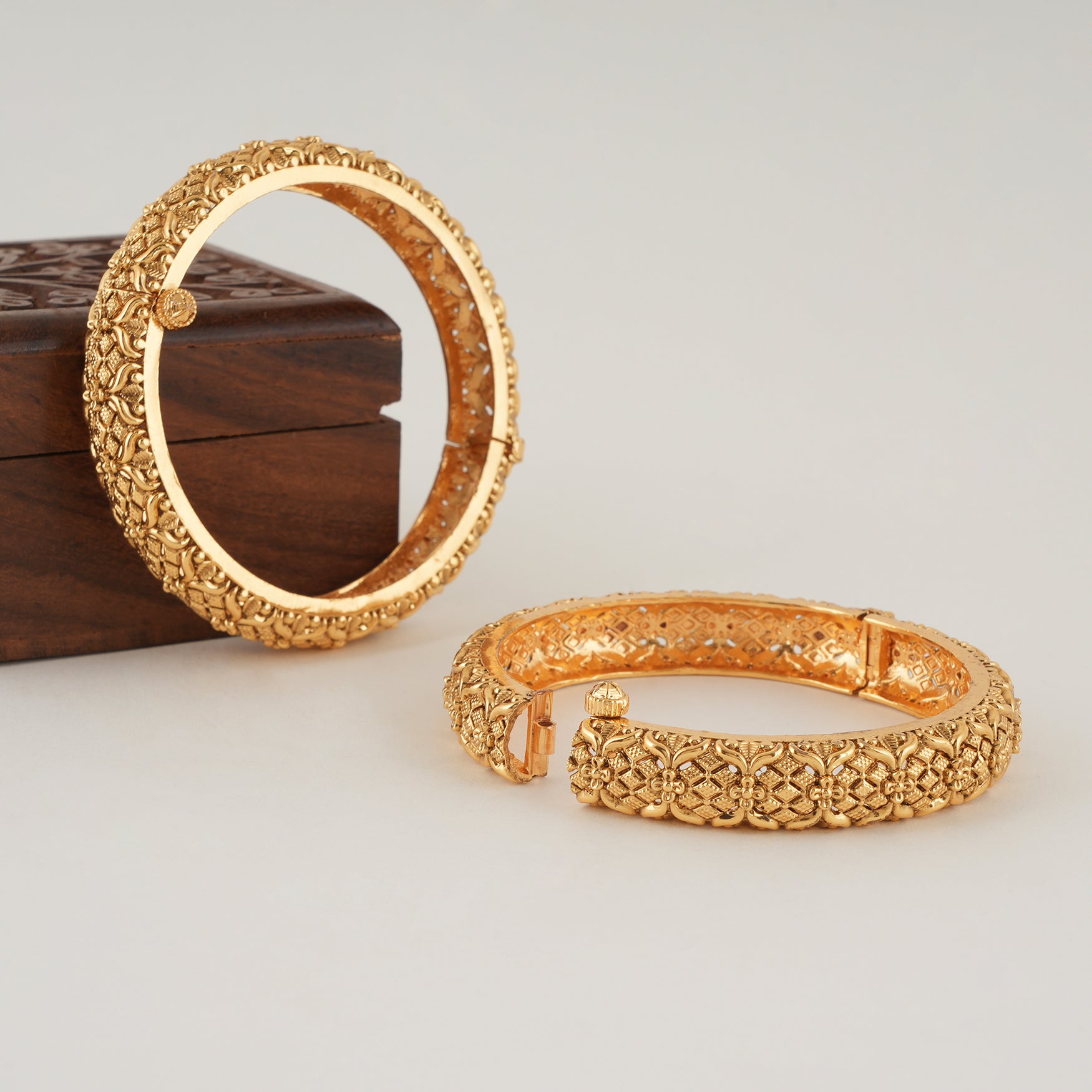 Stunning plain broad gold bangle set