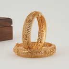Beautiful intricate broad gold bangle set