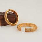 Beautiful intricate broad gold bangle set