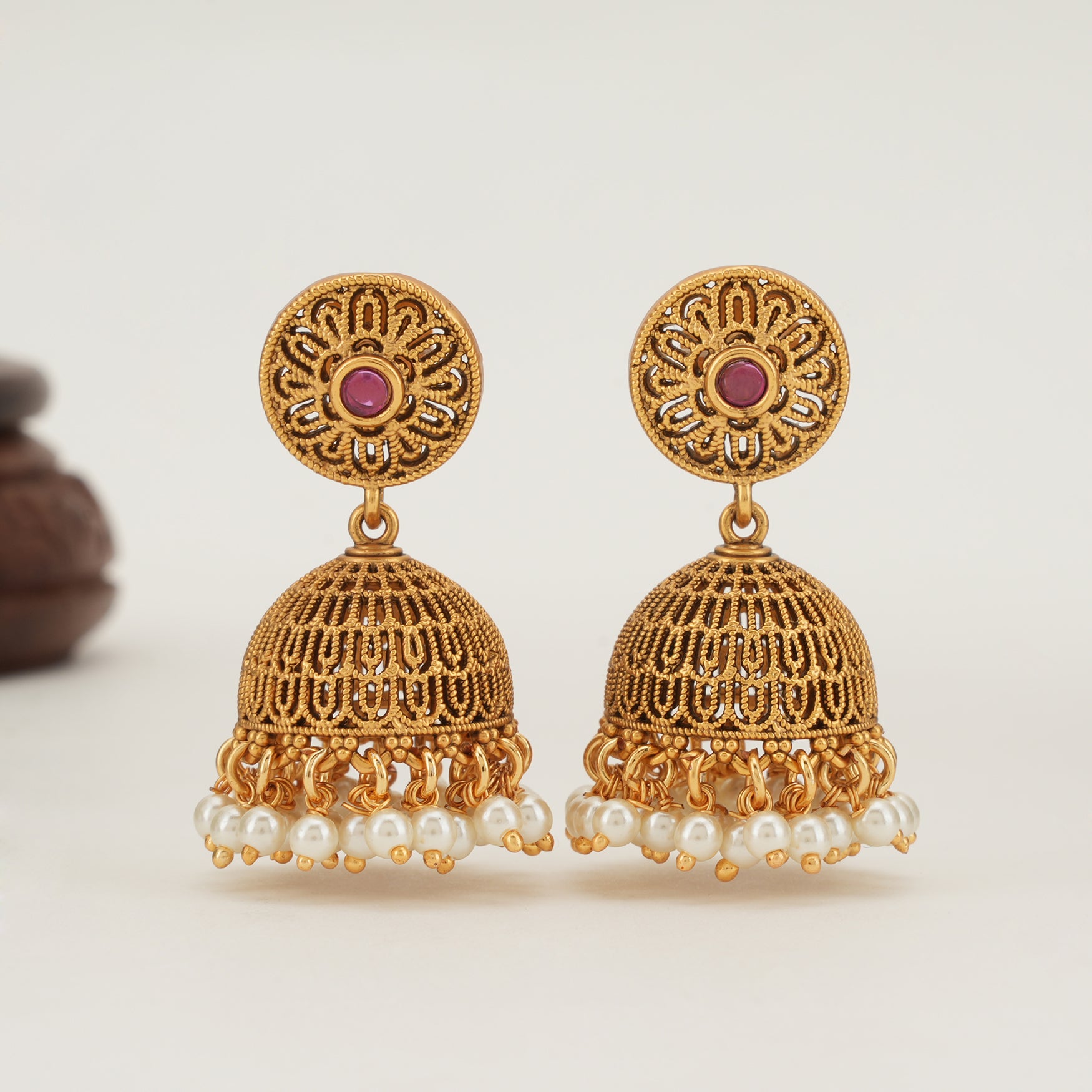 Beautiful pearl drop gold jhumka earring