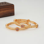 Gold spiral stone bangle set