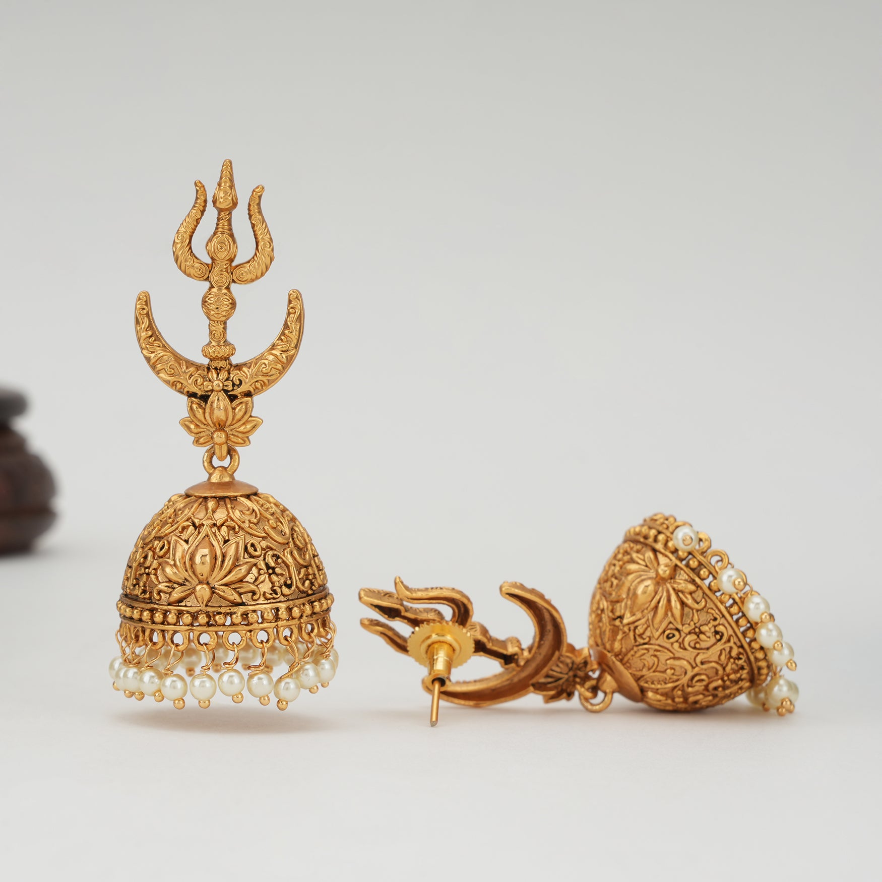 Long antique gold trishul jhumka earring