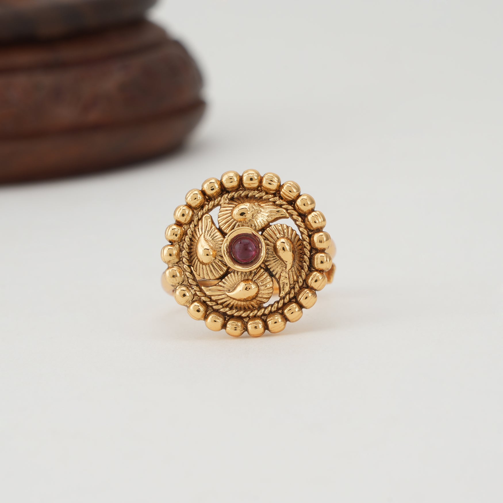 Cute spiral ruby gold finger ring