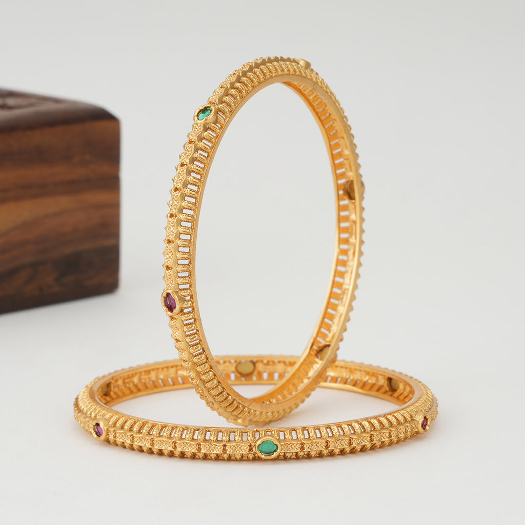 Beautiful stone sleek gold bangle set