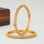 Beautiful stone sleek gold bangle set